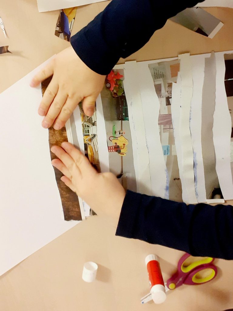 Kleben von Streifen auf Papier